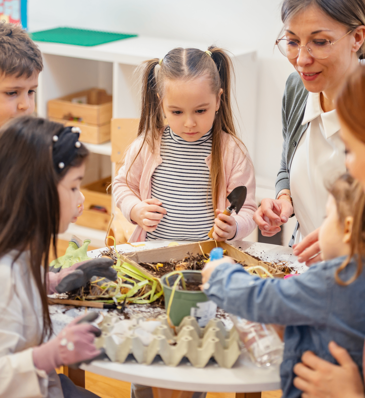 MEYM educators with children at kindergarten
